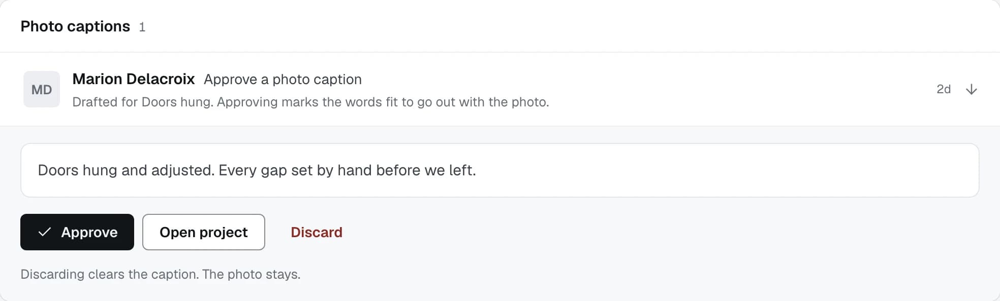 A photo caption row opened in the inbox, with the drafted words and the buttons that approve or reject them
